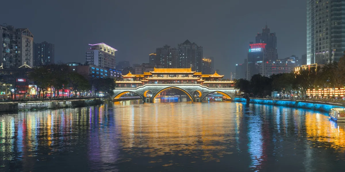 Anshun Bridge and Jinjiang River reflections at night in Chengdu