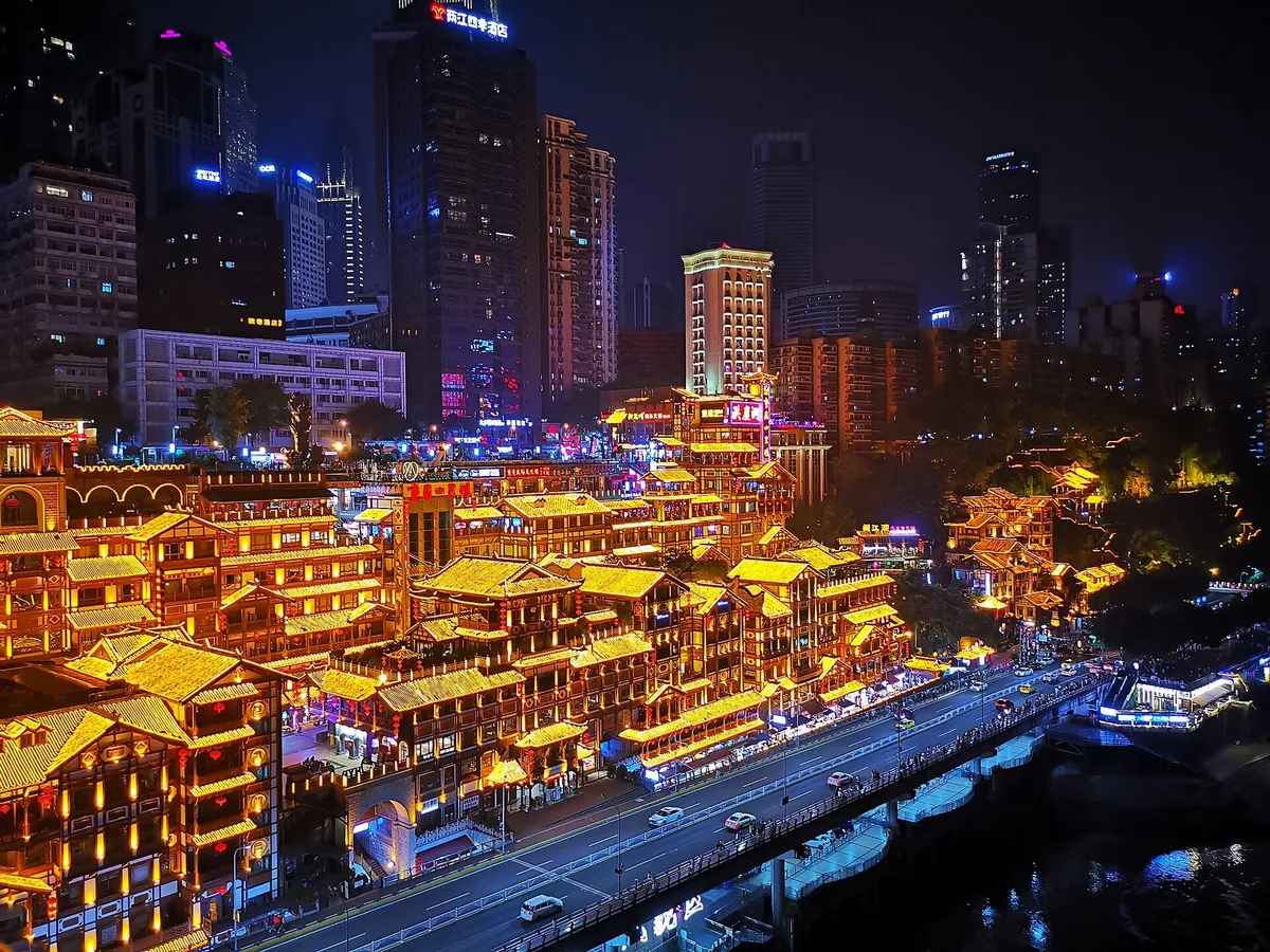 Hongya Cave illuminated at night in Chongqing