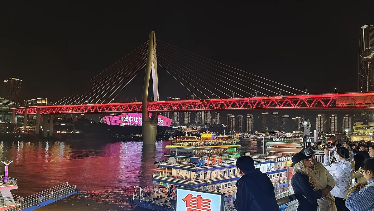Qiansimen Bridge at night from Hongyadong in Chongqing