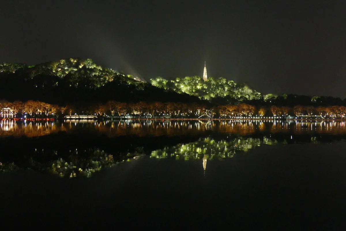 Baochu Pagoda reflection on West Lake at night