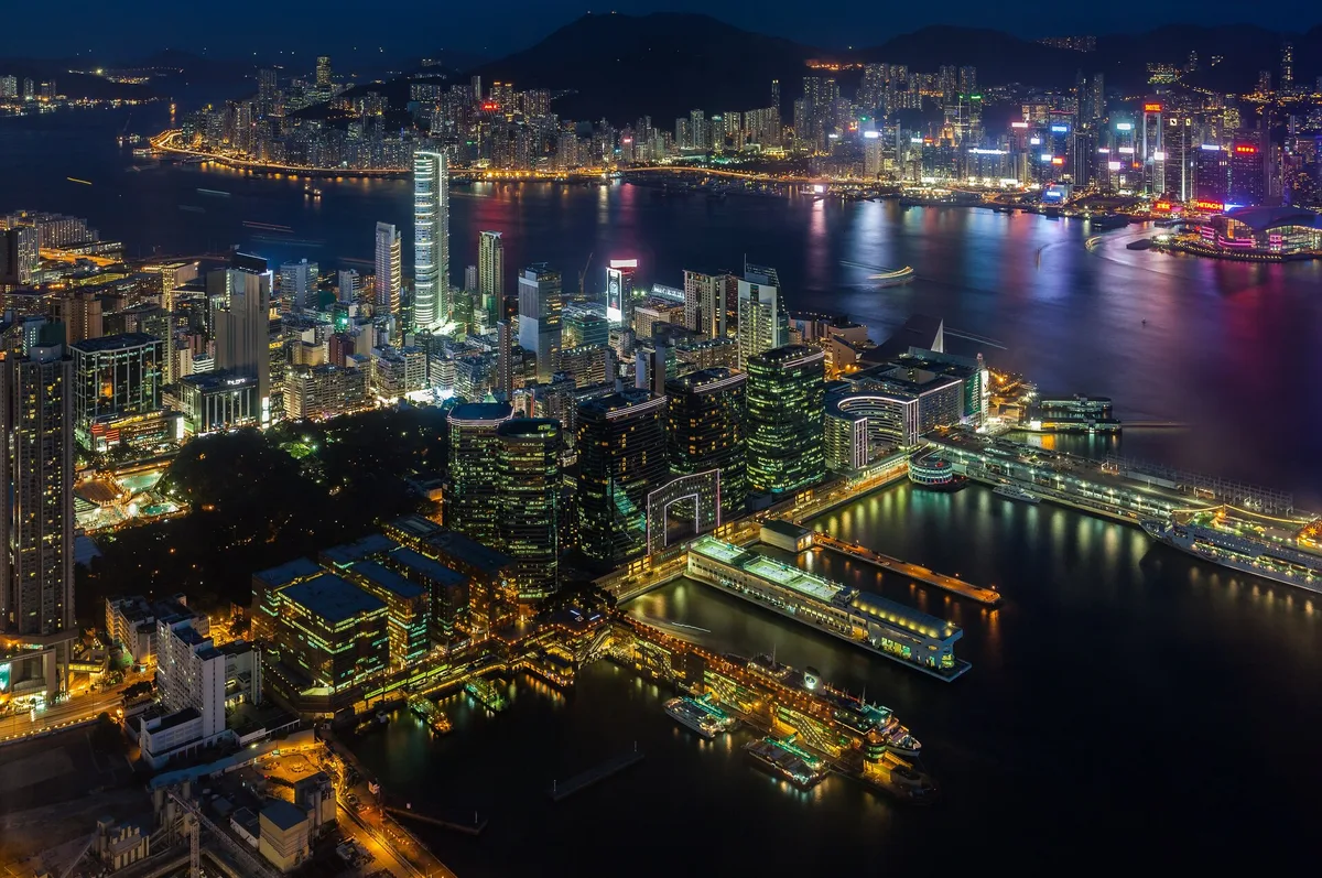 Victoria Harbour and Hong Kong skyline seen from Sky100 at night