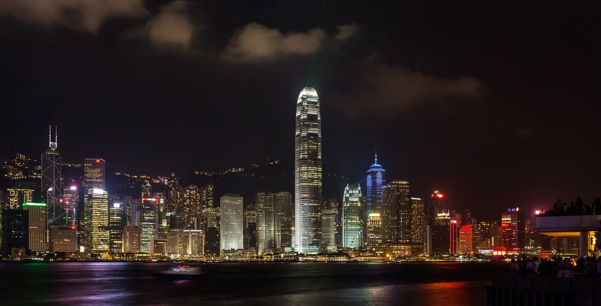 Central skyline lights across Victoria Harbour in Hong Kong