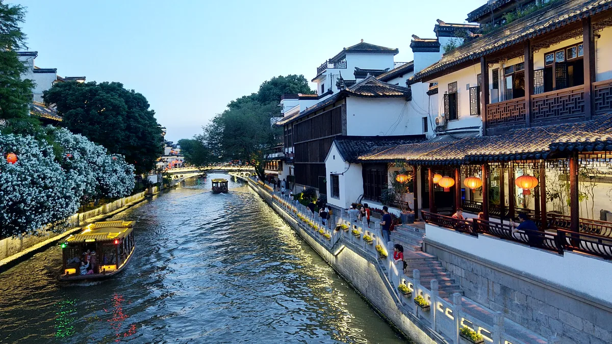 Qinhuai River blue-hour canal lights in Nanjing