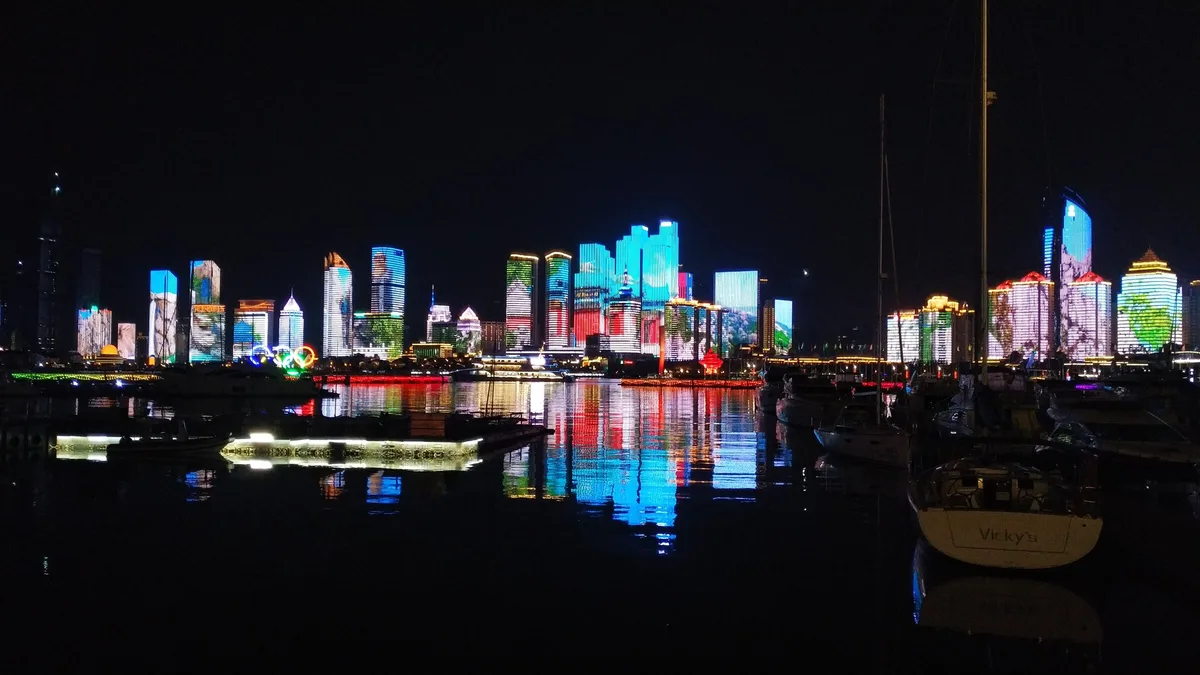Qingdao Fushan Bay skyline lights and water reflections at night