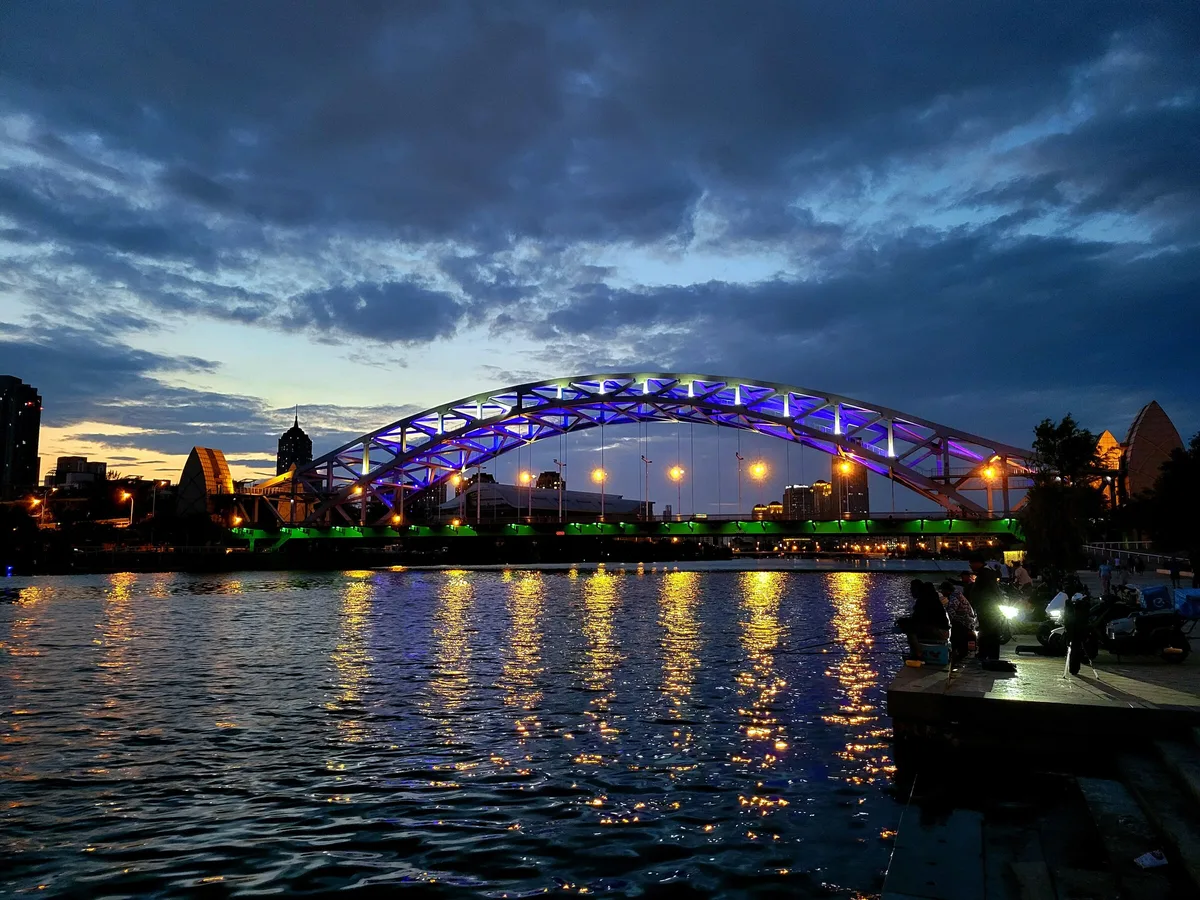 Guotai Bridge and Haihe River reflections in Tianjin at night