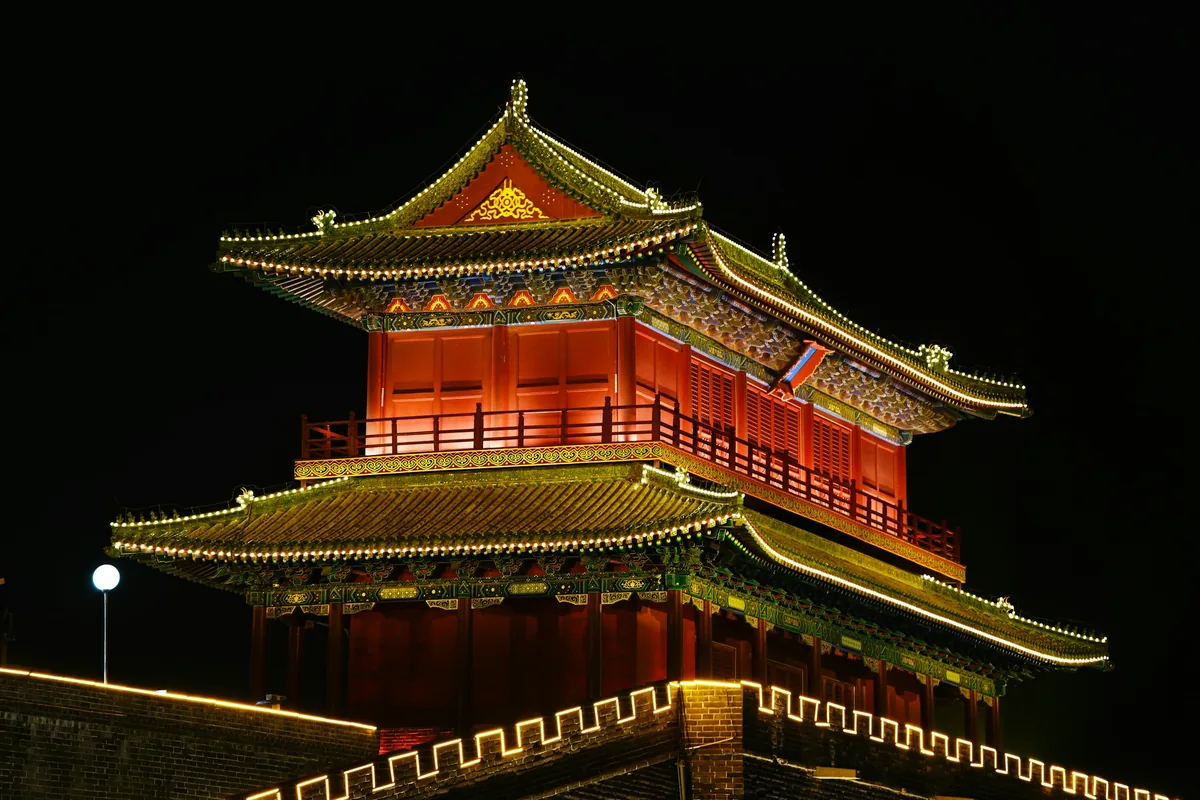 Zhengding South Gate tower lit against the night sky