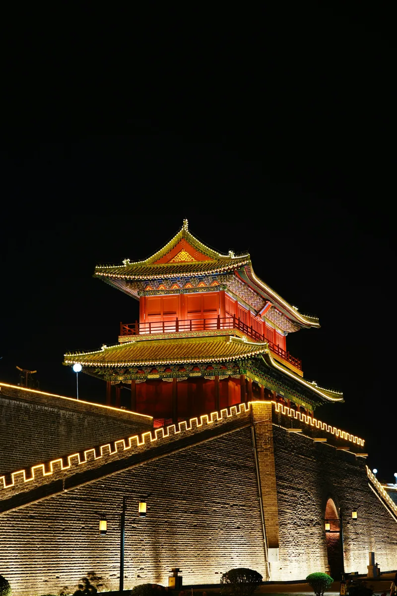 Zhengding ancient tower and city wall lights at night