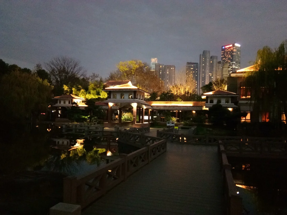 Orange Isle garden lights and Changsha skyline at night