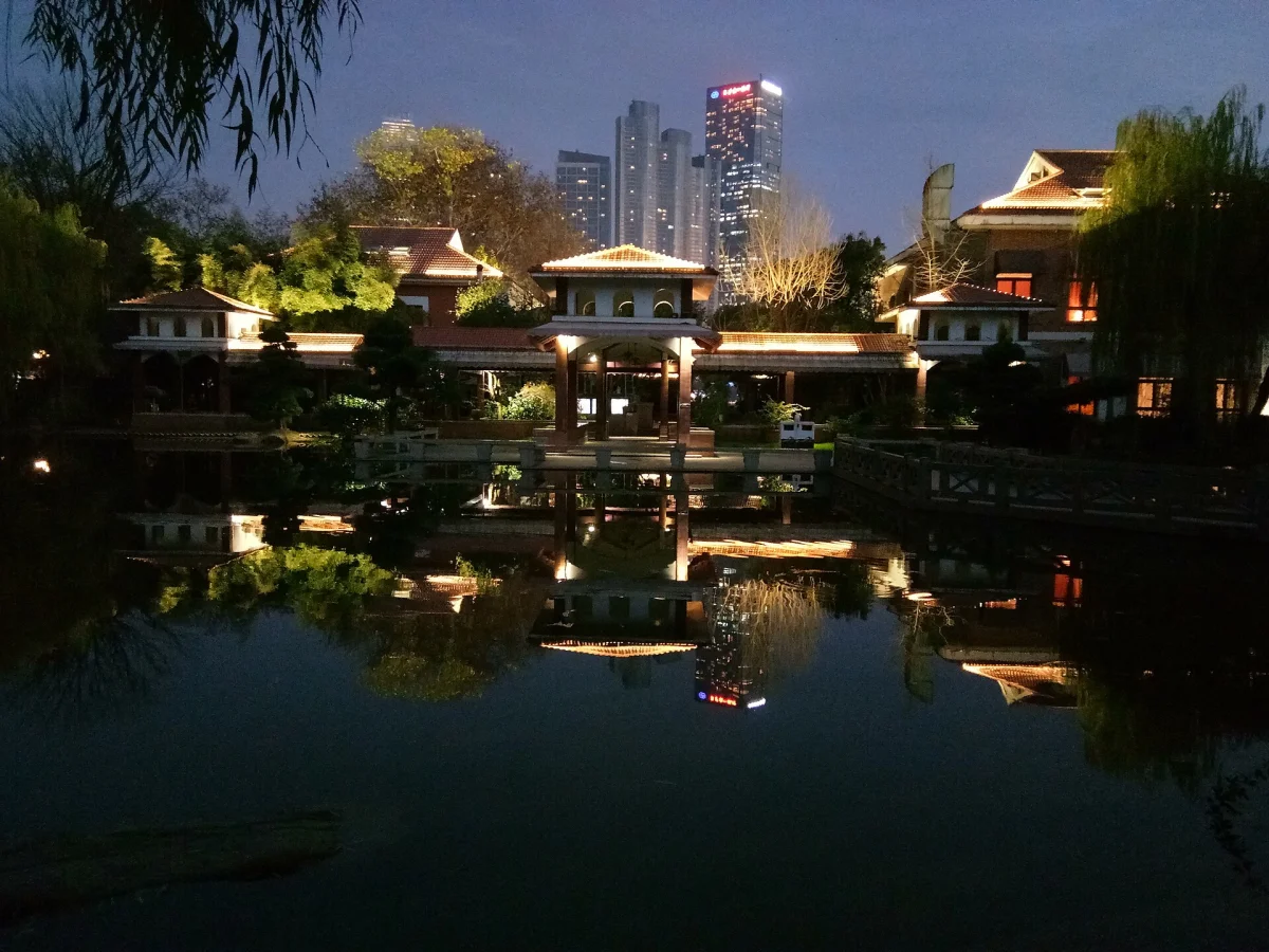 Orange Isle night reflections with city lights in Changsha