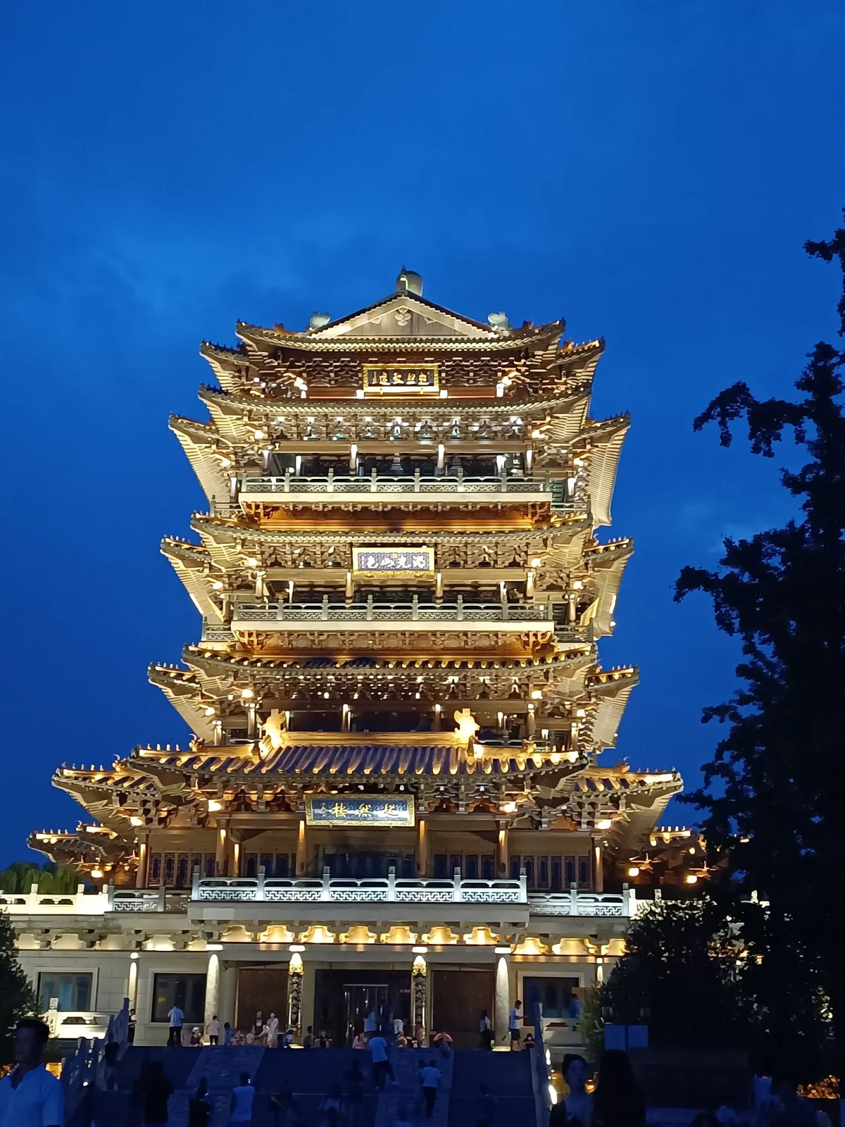 Chao Ran Tower lit up beside Daming Lake at night in Jinan