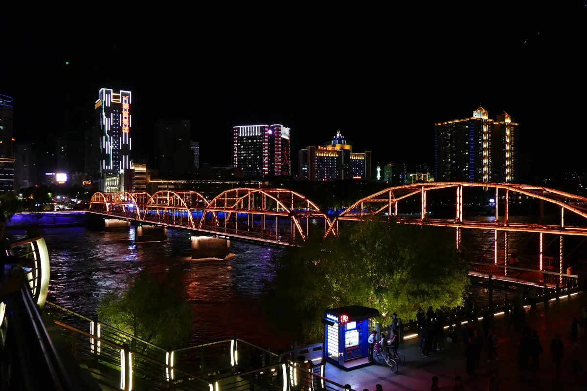 Lanzhou Zhongshan Bridge and Yellow River lights from the north bank at night