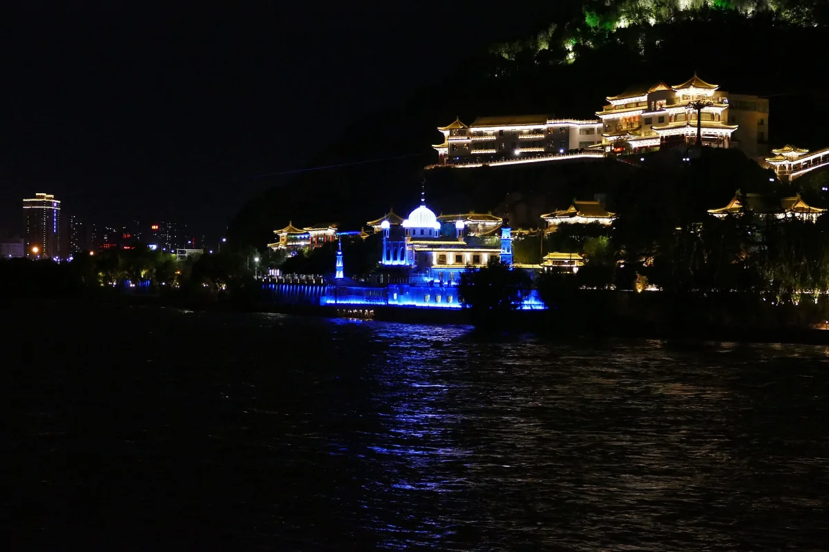 Lanzhou Water Mosque illuminated beside the Yellow River at night