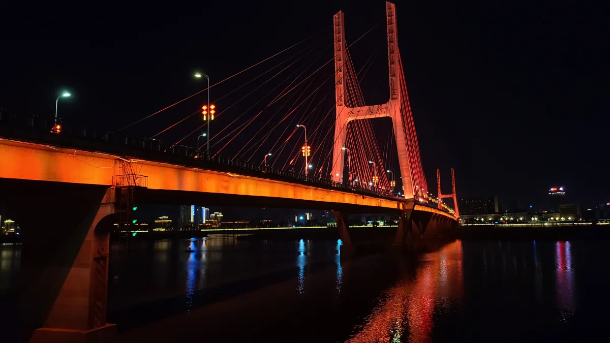 Bayi Bridge glowing over the Gan River in Nanchang at night