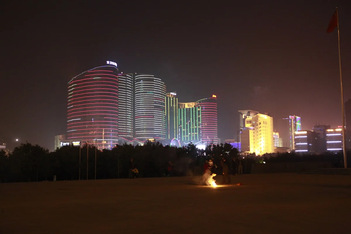 Qingxiu District buildings glowing at night in Nanning