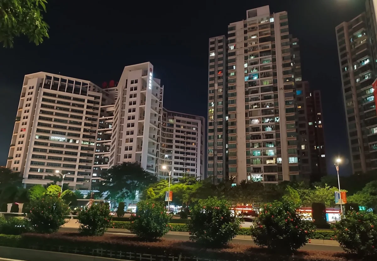 Qingxiu Road residential towers and street lights at night in Nanning