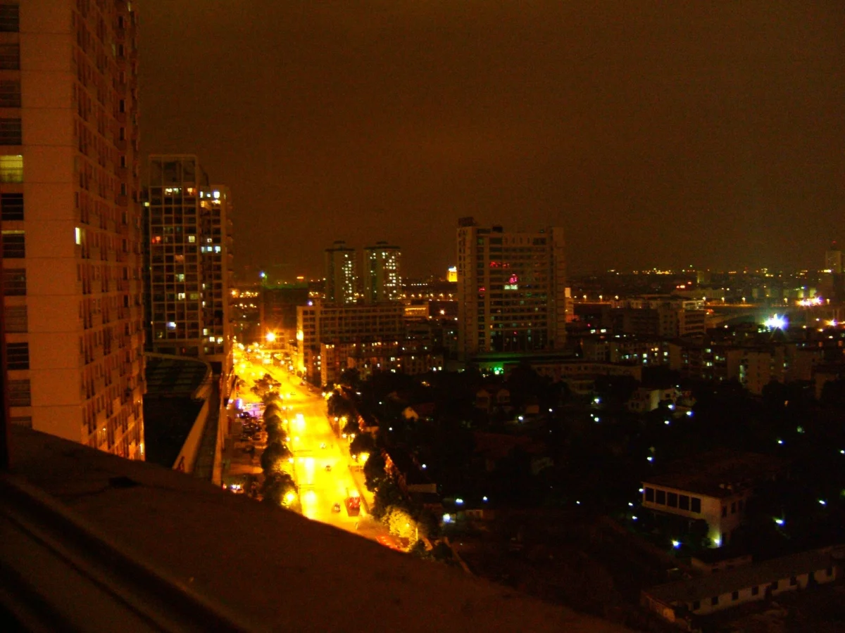 Nanning street grid and tower lights seen from above at night