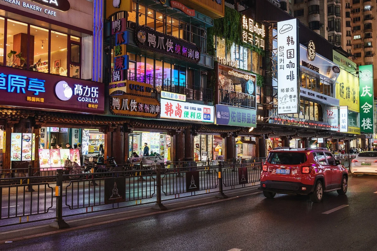Xita Street shopfronts and restaurant lights at night in Shenyang