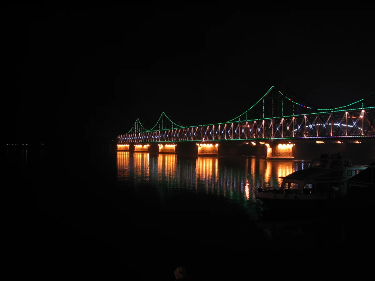 Sino-Korean Friendship Bridge half-lit at night