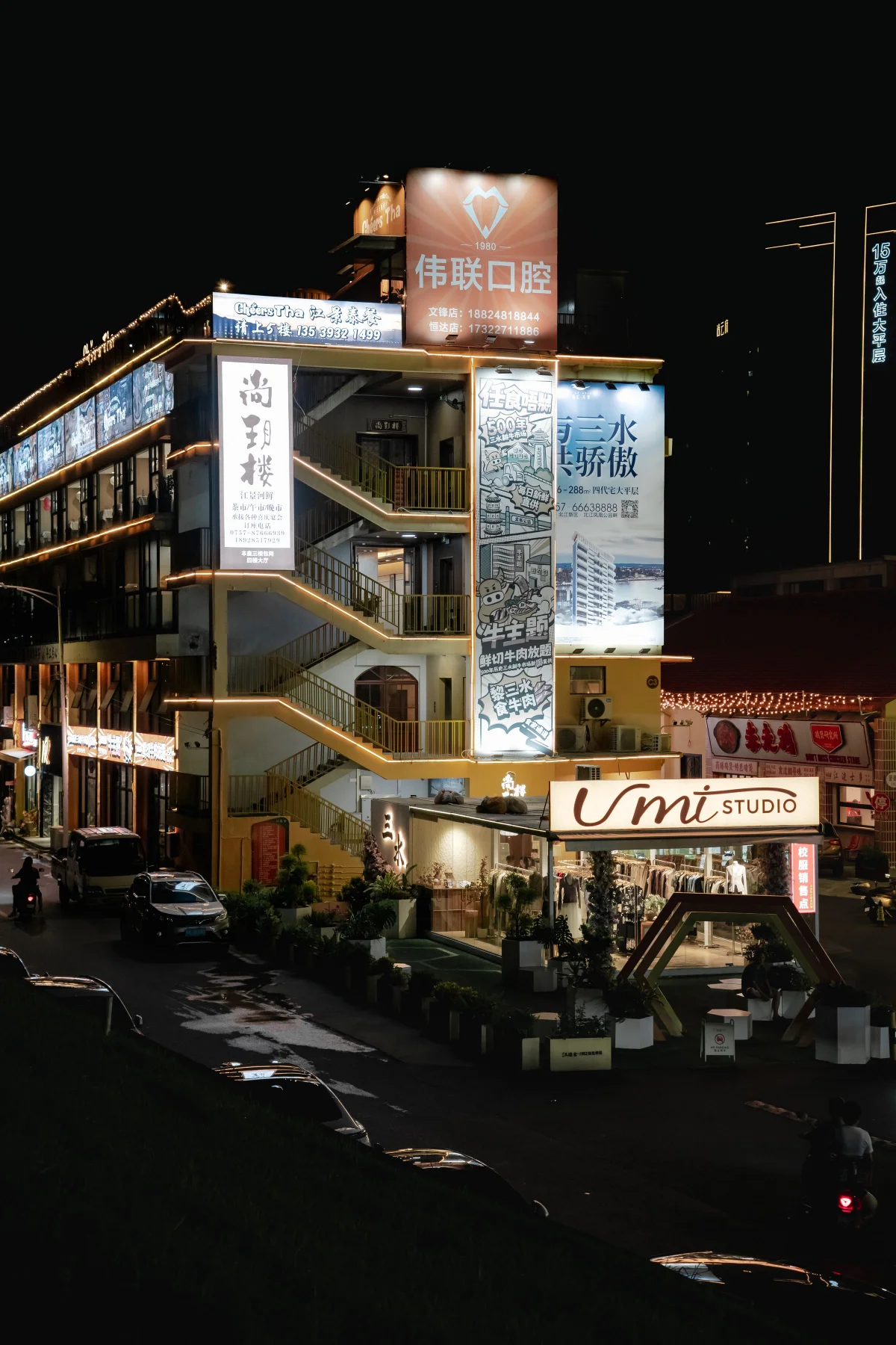 Foshan street signs and shops at night