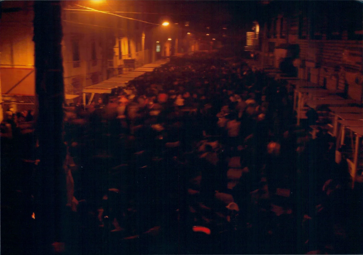 Barkhor night crowd and warm street lamps in Lhasa