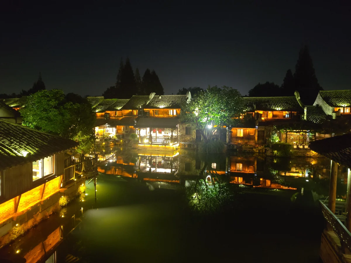 Wuzhen waterfront lights reflected in the canal at night