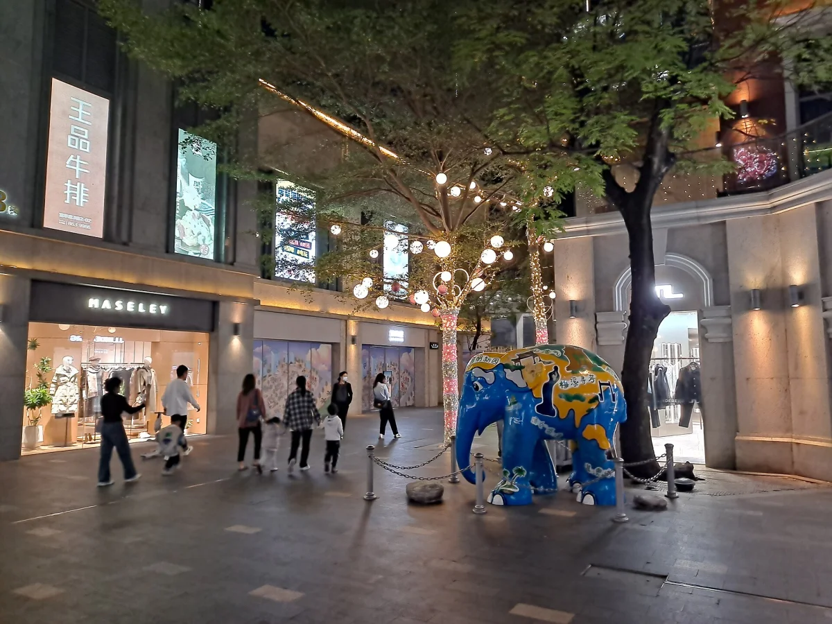 A planted restaurant lane in Fuhuali after dark