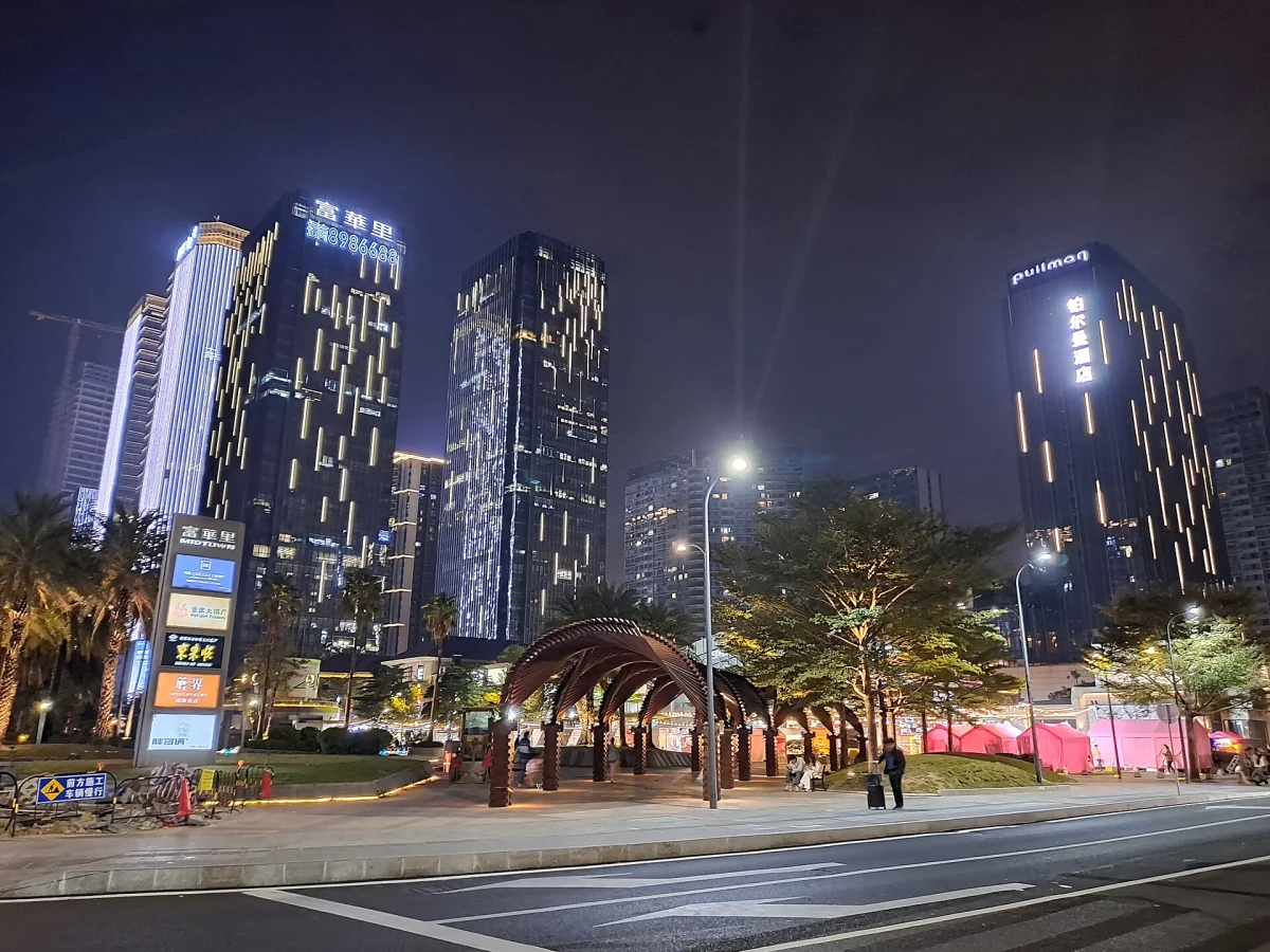 Fuhuali towers and pedestrian entrance at night