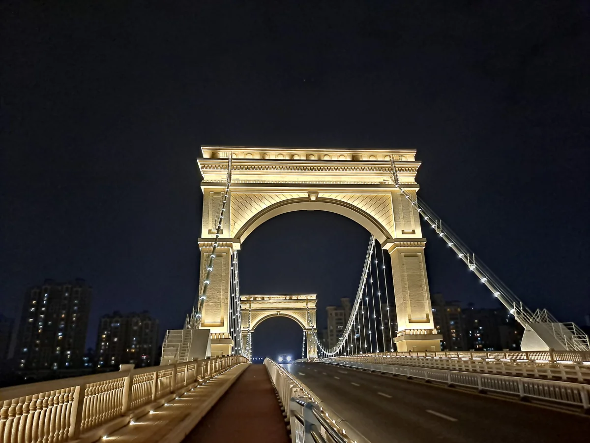 Centered view through the illuminated Xiangshan Bridge arches
