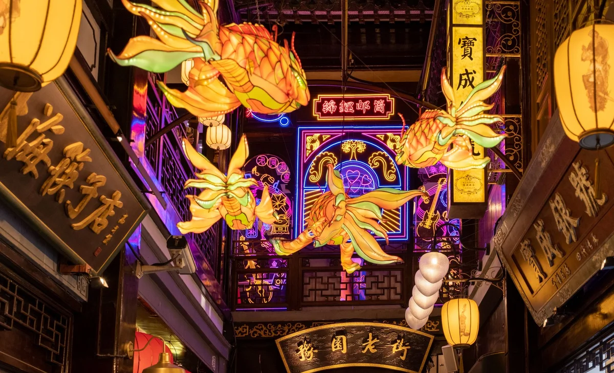 Seasonal illuminated decoration above a Yuyuan Bazaar lane on an earlier visit
